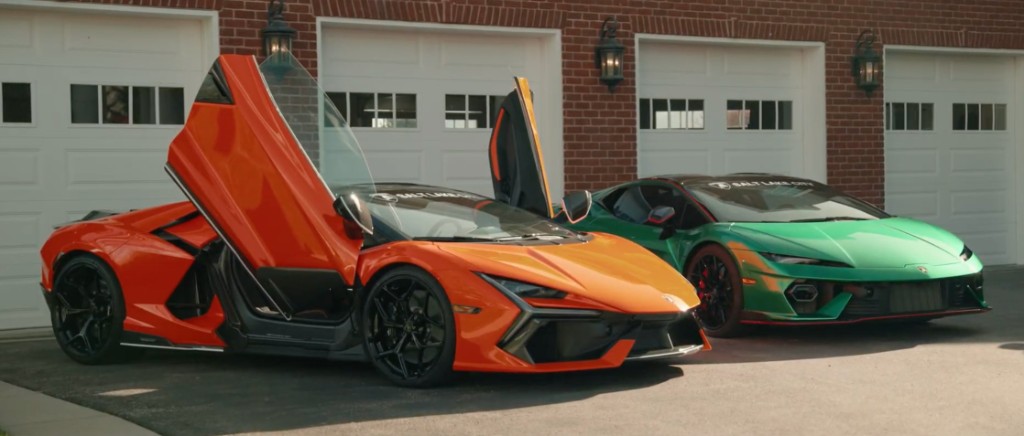 Orange Lamborghini with scissor doors open beside a green Huracán