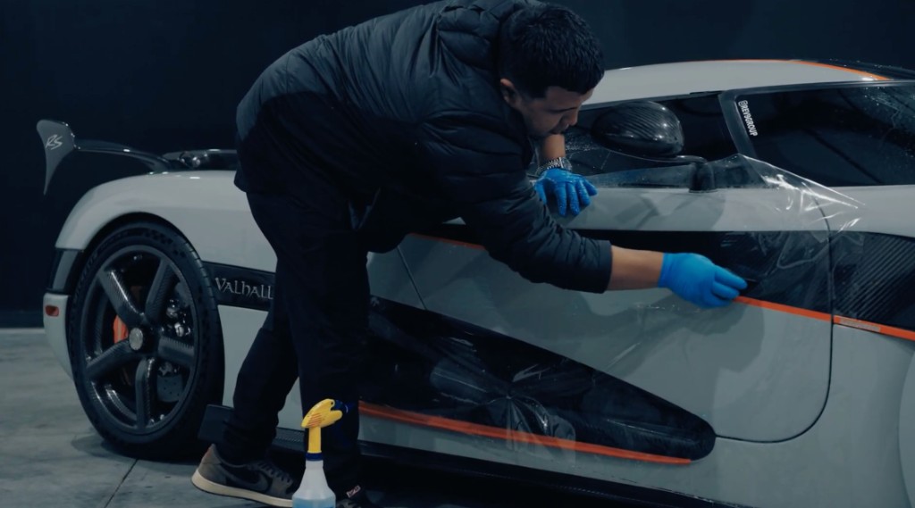 PPF being applied to a Koenigsegg with orange accents