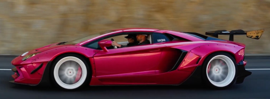 Pink widebody Aventador rolling shot with motion blur